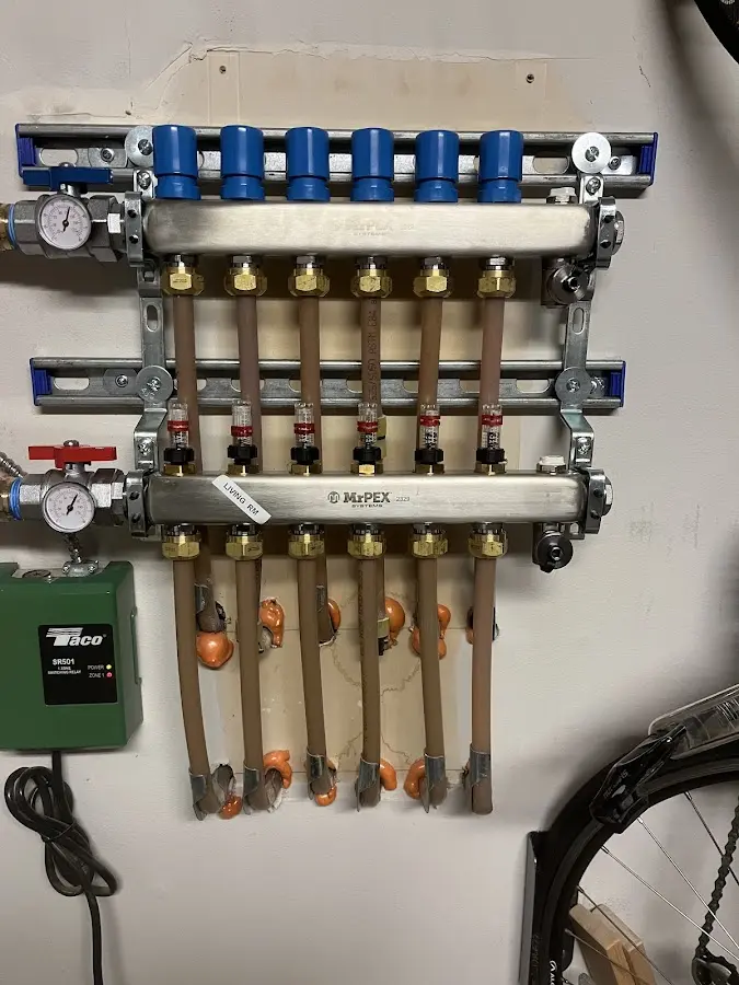 Plumber performing Leak Detection at a residential property in Meredith